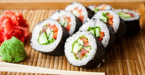 Hand-held rice ball sushi maker
